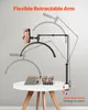 A clip-on LED lamp with a phone holder is shown attached to a table, with nail polish and tools displayed on the table. Produktbild-Vorschau