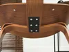 Close-up view of the underside of a wooden chair, showing the metal bracket and wood grain. Voir les images du produit