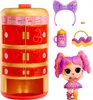 A doll and accessories are displayed next to a toy vending machine. Náhled obrázku produktu