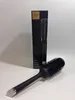 A GHD hair brush and its packaging are displayed against a neutral background. Podgląd zdjęcia produktu