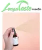 A hand sprays a bottle of propolis mouth spray against a peach-colored background. Podgląd zdjęcia produktu