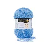 A ball of blue yarn with a label. Náhled obrázku produktu