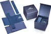 A collection of blue watch packaging components, including a box and its inserts, laid out flat and open. Produktbild-Vorschau