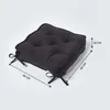 A black seat cushion with ties, shown from a diagonal angle with dimensions indicated. Anteprima dell’immagine prodotto