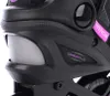 A close-up view of the side of a black inline skate, showing the 'COMFORTPLUS' text and a pink 'WENOX' tag. Podgląd zdjęcia produktu