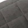 A close-up view of a quilted gray fabric, likely a blanket or similar textile product. Produktbild-Vorschau