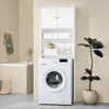 A white washing machine with a white storage unit above it, placed in a bathroom setting. Náhled obrázku produktu