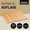 A bamboo mat is shown diagonally on a light brown background. Produktbild-Vorschau