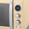 Close-up of the control panel of a cream-colored retro-style microwave. Náhled obrázku produktu