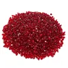 A pile of red, faceted gemstones on a white background. Anteprima dell’immagine prodotto