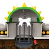 A close-up view of a Bowser Castle playset with a cage hanging in the center. Náhľad obrázku produktu