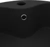 A close-up view of a black ceramic sink with a drain. Náhled obrázku produktu