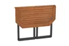 A wooden folding table with black metal legs, shown from the side. Produktbild-Vorschau