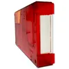 A red and clear taillight lens for a vehicle, shown from a side angle against a white background. Produktbild-Vorschau