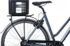 A close-up side view of a bicycle's rear wheel, fender, and rear rack with a black crate attached. Anteprima dell’immagine prodotto