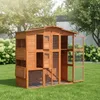 A wooden chicken coop with an attached run is set up on a green lawn in a backyard setting, with trees and bushes in the background. Anteprima dell’immagine prodotto