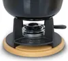 Close-up of a fondue pot stand with a bamboo base. Podgląd zdjęcia produktu