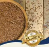 A wooden bowl filled with flax seeds on a wooden surface, with scattered seeds and a marketing badge. Produktbild-Vorschau