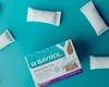 A box of BAYROL Superflock Plus pool treatment products is shown on a blue background, with several individual product packets scattered around. Anteprima dell’immagine prodotto