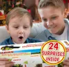 Two young boys are looking at a CLAAS Advent Calendar with excitement. Produktbild-Vorschau