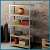 A metal shelving unit filled with various items, including a basketball, toolboxes, and boxes, in a garage or storage area. Podgląd zdjęcia produktu