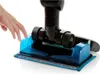 A hand is shown touching the blue part of a vacuum cleaner head. Náhľad obrázku produktu