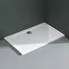 A white rectangular shower tray with a drain is shown in a bathroom setting with dark gray tiled walls and light gray tiled floor. Produktbild-Vorschau
