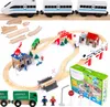 A wooden train set with various accessories laid out on a white background. Náhled obrázku produktu