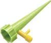 A green and yellow plant watering spike is shown against a white background. Anteprima dell’immagine prodotto