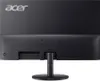The back view of a black computer monitor on a black background. Produktbild-Vorschau