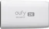 A white Eufy Security camera with the Eufy logo and '2K' resolution indicator. Voir les images du produit