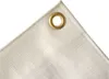 A close-up view of the corner of a white tarp with a brass grommet. Produktbild-Vorschau