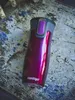 A Contigo brand travel mug is shown on a textured, multi-colored surface. Produktbild-Vorschau