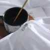 4-teiliges Bettwäsche-Set mit eingewebtem Muster und Produktbild-Vorschau 6