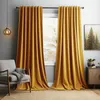 A living room scene with curtains, a chair, and a cabinet. Produktbild-Vorschau