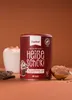 A can of Xucker hot chocolate powder is displayed prominently, with a cup of hot chocolate, chocolate pieces, and a scoop of powder surrounding it. Voir les images du produit