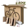 A cardboard box designed for shipping e-bikes and bicycles, along with some protective packaging materials. Produktbild-Vorschau