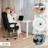 A woman is sitting at a height-adjustable desk in a home office setting, talking on her phone. The image also includes close-up insets showing product features. Produktbild-Vorschau