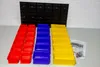 A set of storage bins and a wall-mounted rack are displayed on a table. Produktbild-Vorschau