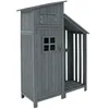 A gray wooden garden shed with an open storage area on the right. Anteprima dell’immagine prodotto