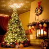 A decorated Christmas tree and fireplace scene. Produktbild-Vorschau