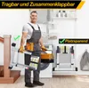 A man in work overalls is holding a folded ladder in a laundry room setting with a washing machine and shelves. Anteprima dell’immagine prodotto