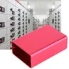 A red aluminum enclosure is placed in front of a background showing rows of electrical cabinets. Náhled obrázku produktu