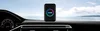 A car's dashboard with a Carlinkit device mounted on it, overlooking a scenic ocean view. Produktbild-Vorschau
