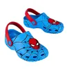 A pair of blue Spider-Man clogs with red straps and Spider-Man emblems on a white background. Produktbild-Vorschau