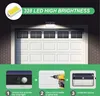 A solar-powered light is installed above a garage door, with instructions on how to install it shown below. Produktbild-Vorschau