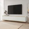 A modern living room with a wall-mounted TV and media console. Náhled obrázku produktu