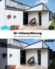 A split image showing a modern house exterior, with the top half highlighting 2K video resolution and the bottom half showing 1080P resolution. A person and a dog are sitting on a bench in both scenes. Náhled obrázku produktu
