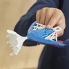 A child's hand holding a Spiderman toy. Náhled obrázku produktu