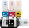 Four bottles of printer ink, three upright and one lying down, against a white background. Produktbild-Vorschau
